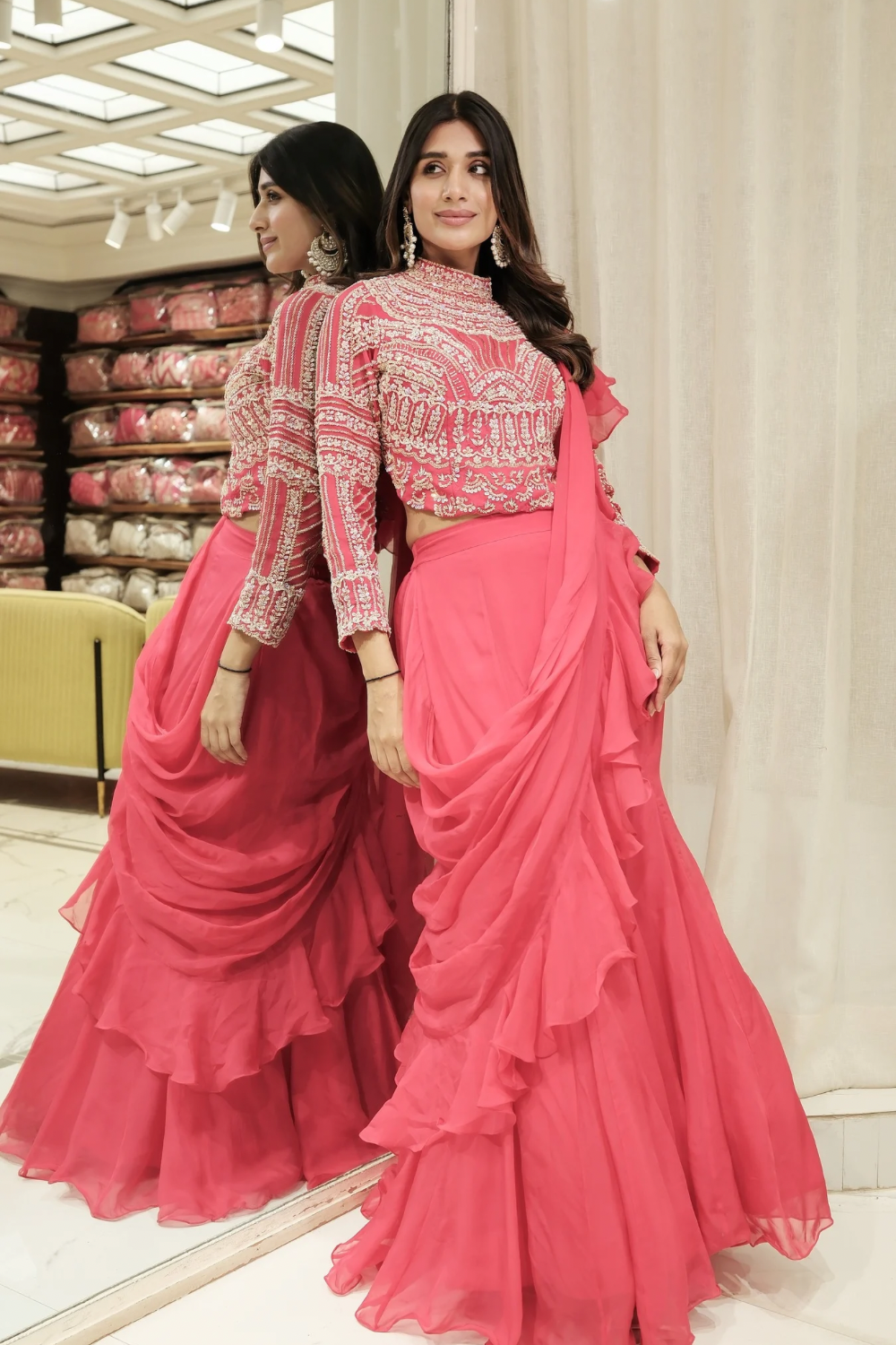 Coral pink organza ready-to-wear saree with zardozi and pearl work