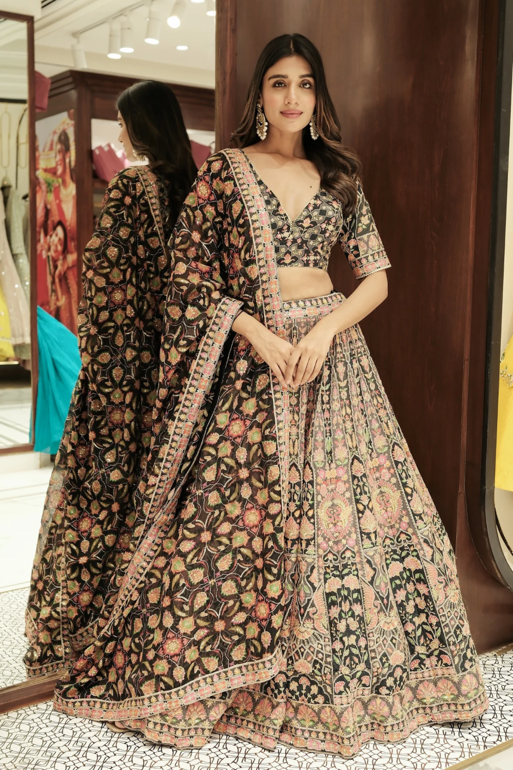 Black silk lehenga choli with thread and sequins work