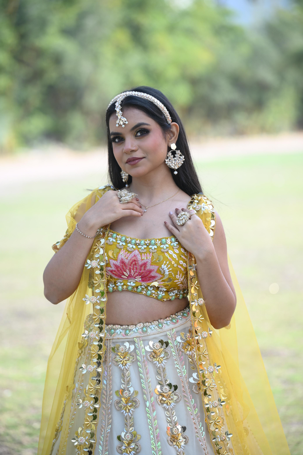White & yellow lehenga choli with sequins and pearl work