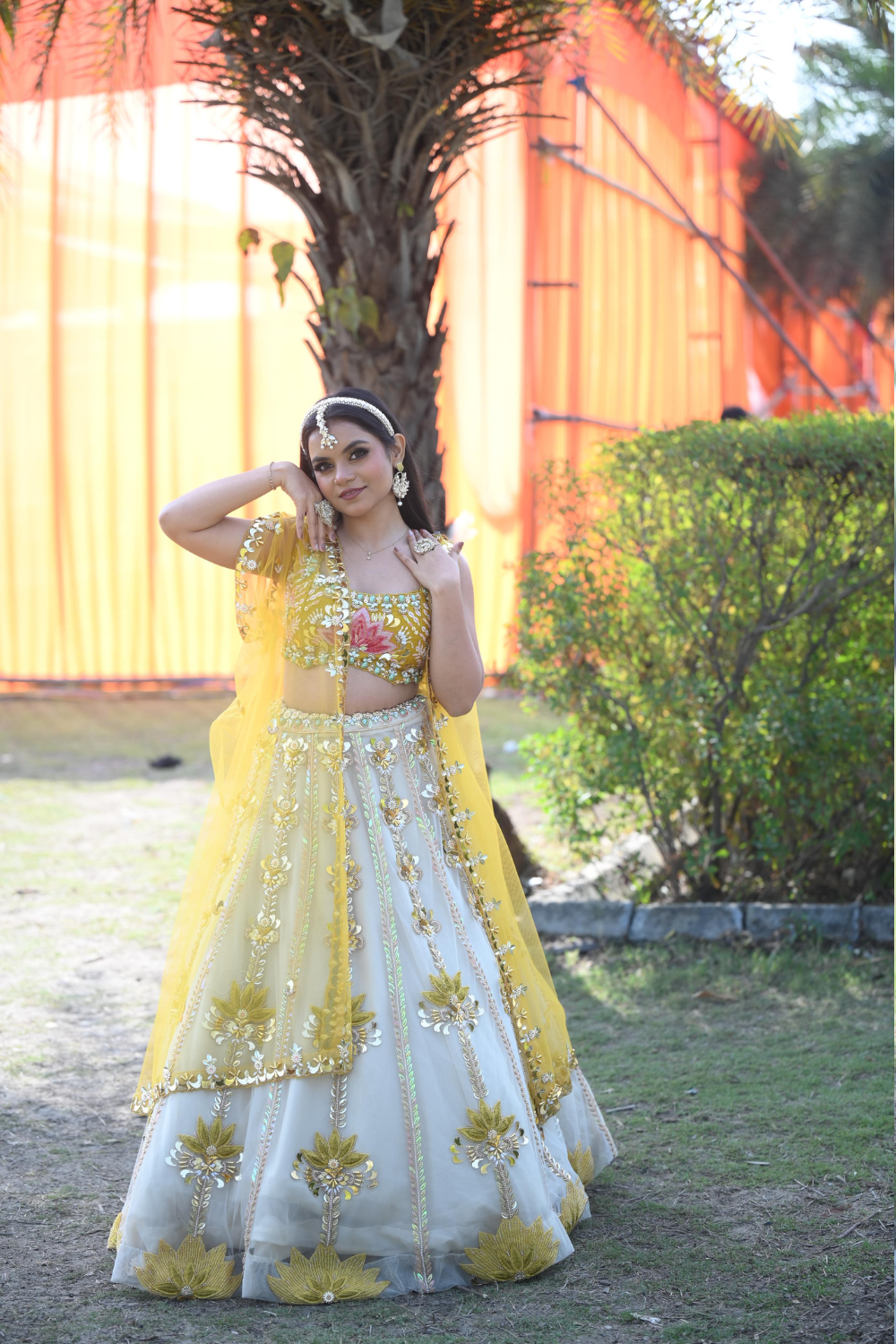 White & yellow lehenga choli with sequins and pearl work
