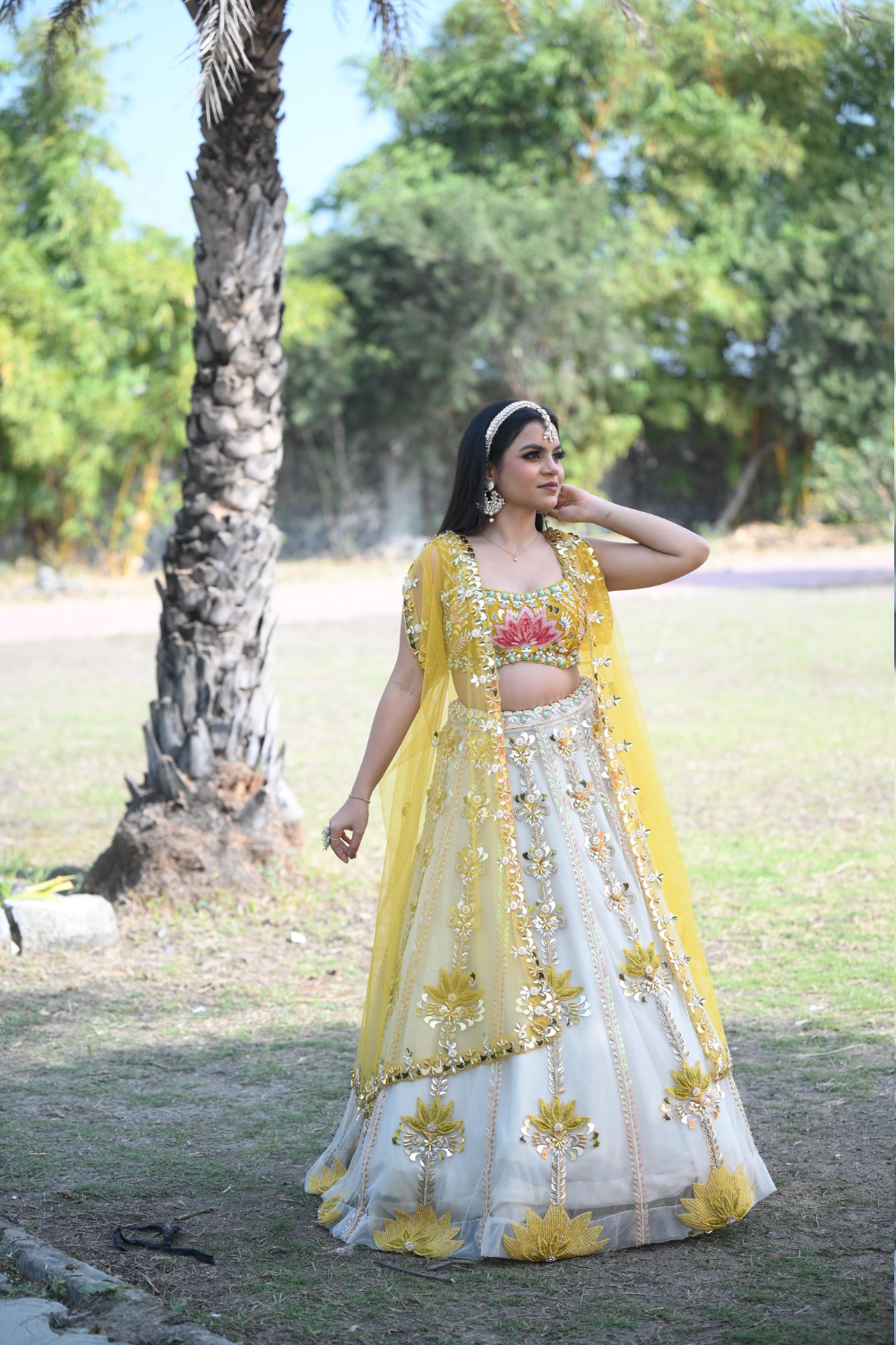 White & yellow lehenga choli with sequins and pearl work