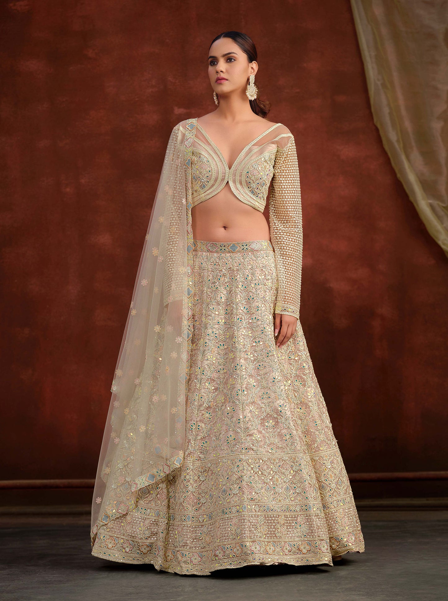 Cream Heavy Hand Work & Cutwork Net Reception Lehenga for Bride