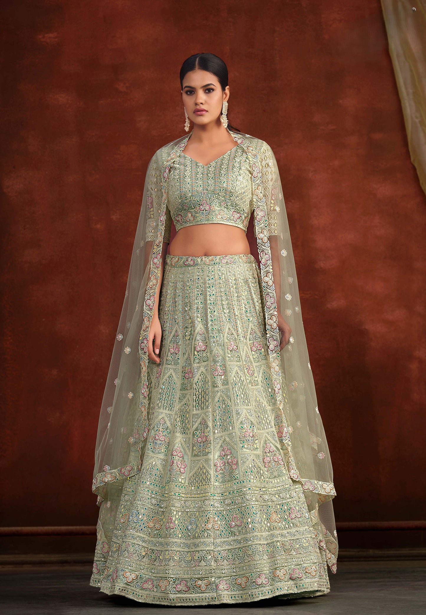 Pista Green Heavy Hand Work & Cutwork Net Mehendi Lehenga