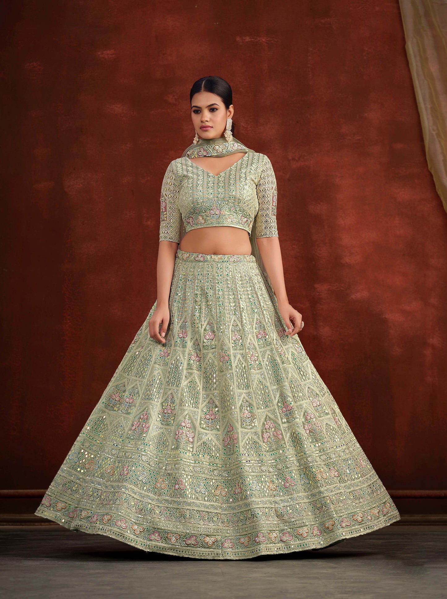 Pista Green Heavy Hand Work & Cutwork Net Mehendi Lehenga