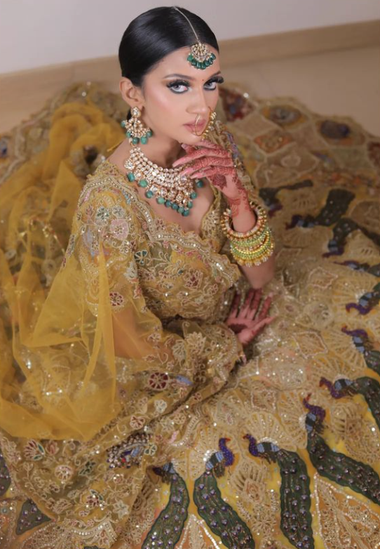 Yellow Net Bridal Lehenga with Peacock Motifs & Zari, Sequins Work