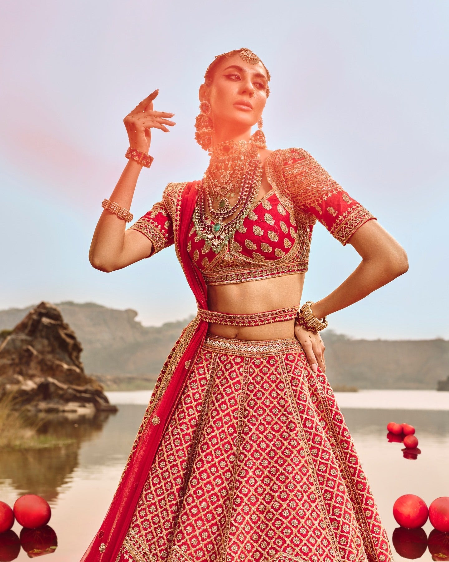 Red Heavy Butti Embellished Silk Bridal Lehenga