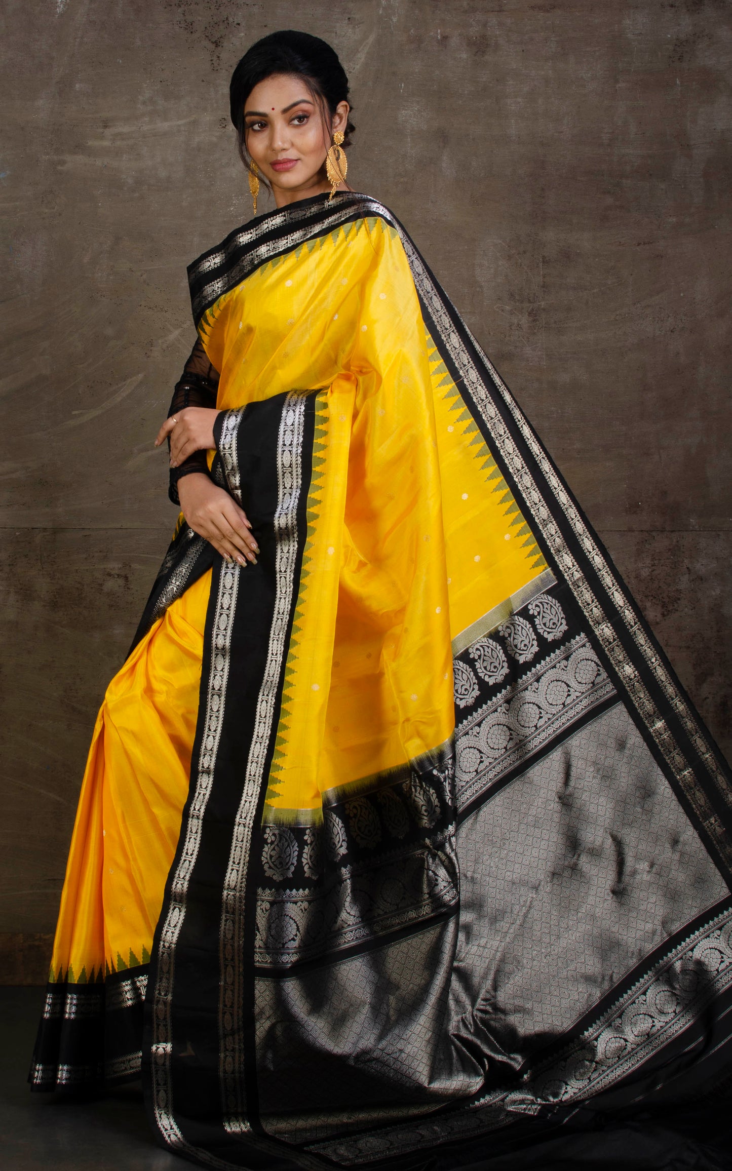 Exclusive Gadwal Silk Saree in Yellow, Black and Silver Zari Work