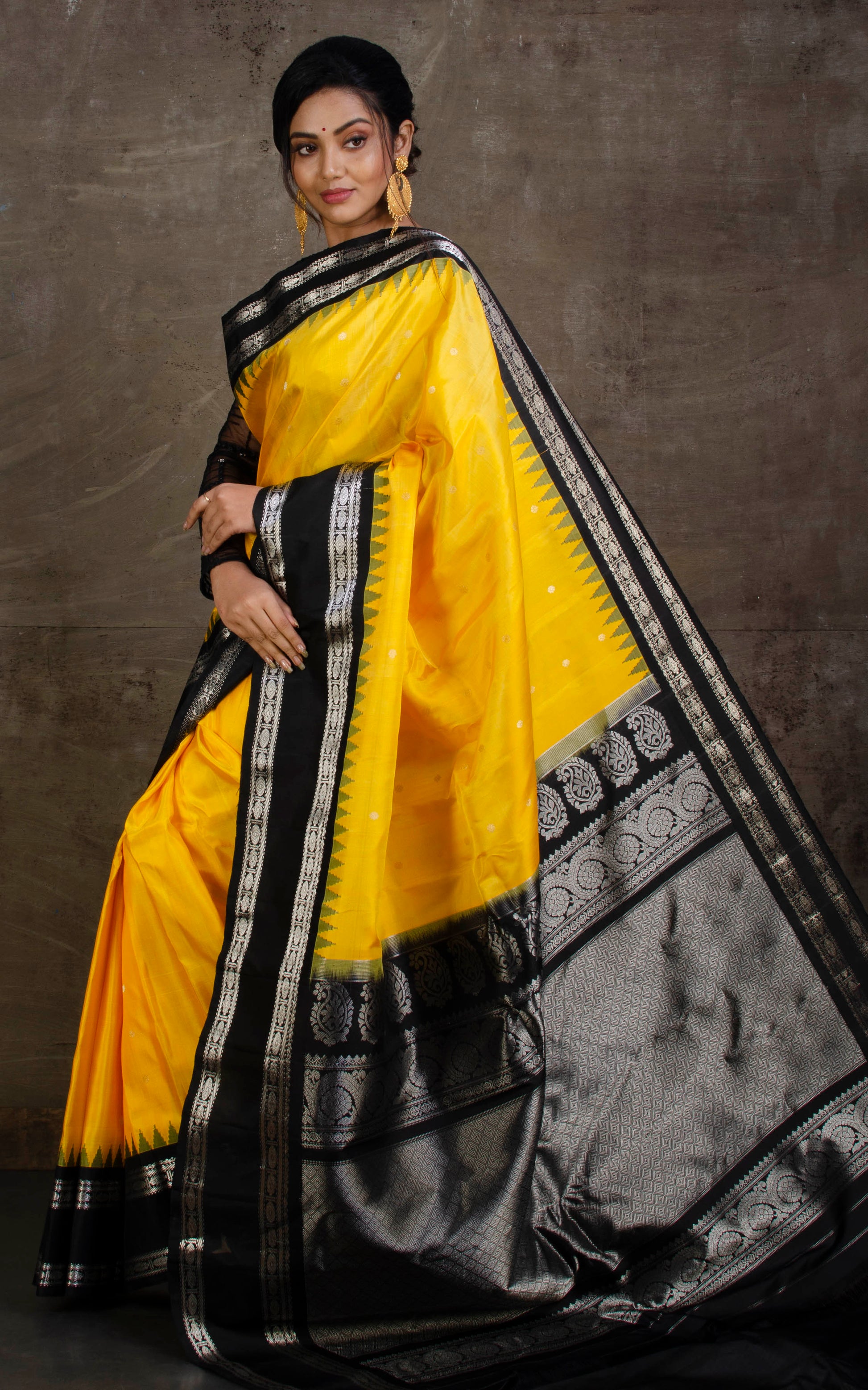 Exclusive Gadwal Silk Saree in Yellow, Black and Silver Zari Work