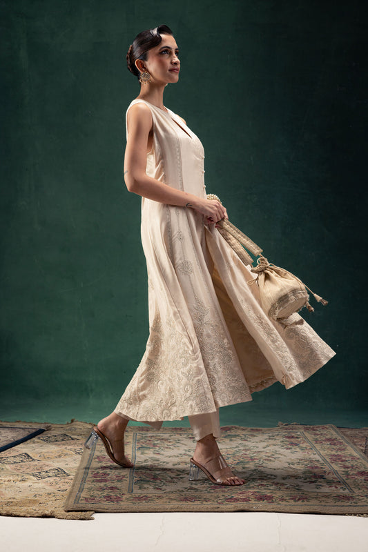 Suhana Off White Silk Anarkali with Embroidered Hemline and Keyhole Neckline