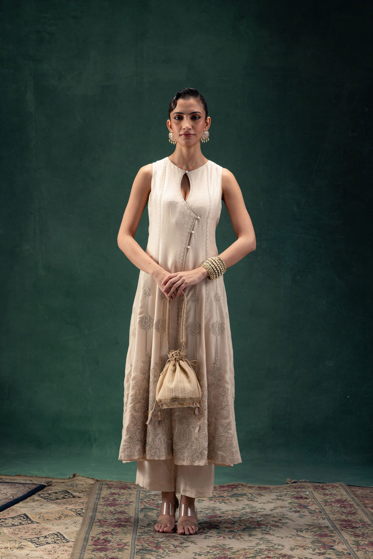 Suhana Off White Silk Anarkali with Embroidered Hemline and Keyhole Neckline