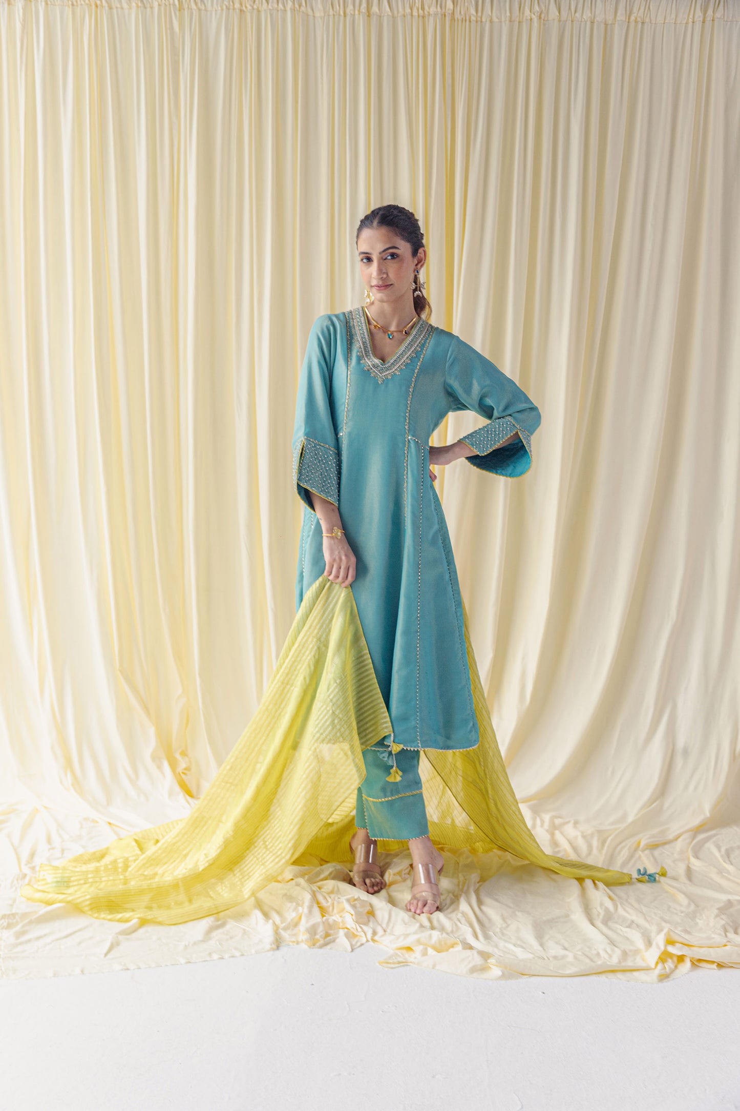 Rivaah Turquoise Blue Bamber Tissue Kurta Set with Dori Embroidery and Moti Work and a Contrasting Lemon Jacquard Dupatta