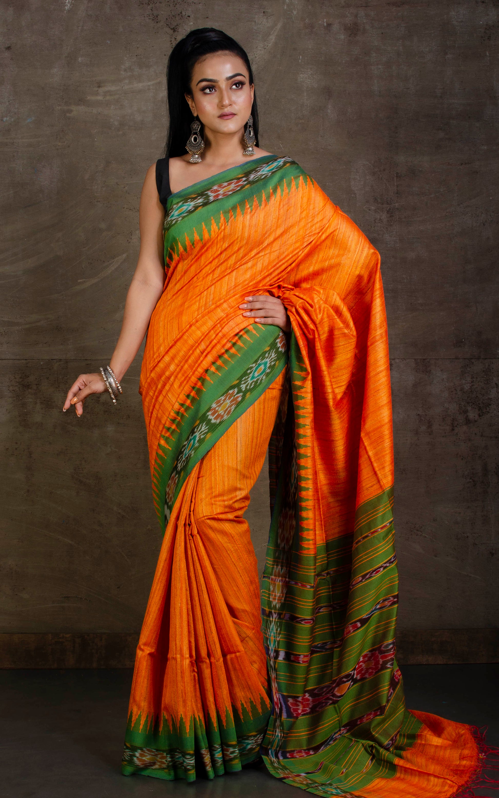 Tussar Sambalpuri Work Kotki Silk Saree in Orange Peel and Forest Green