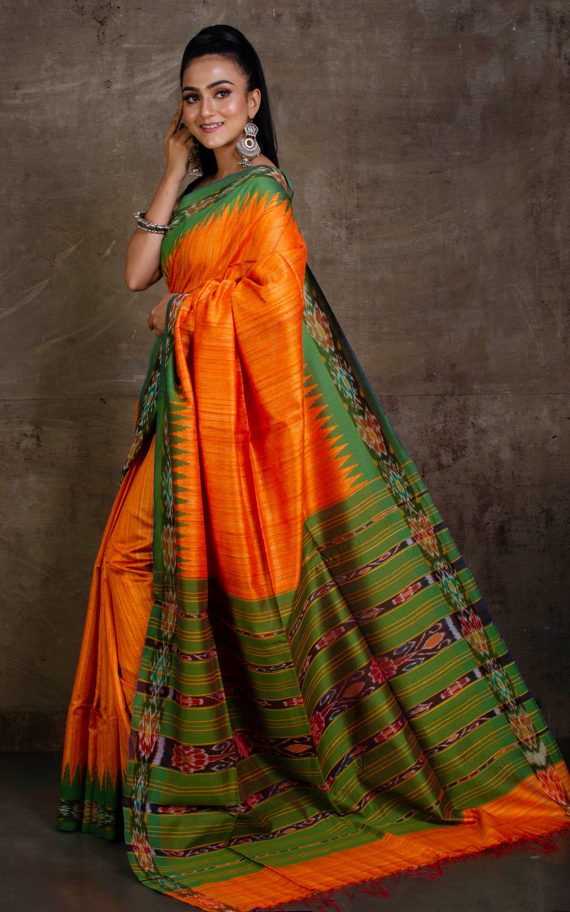 Tussar Sambalpuri Work Kotki Silk Saree in Orange Peel and Forest Green