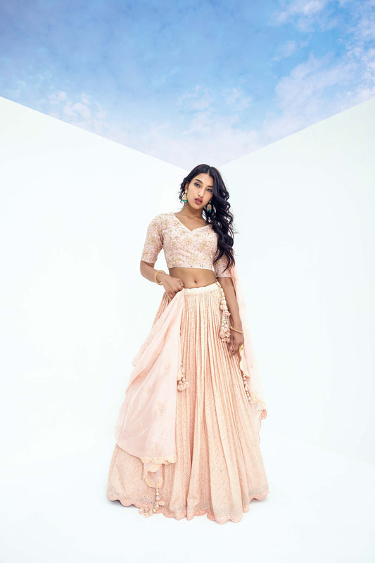 Looking for Bridesmaid outfits? Explore our collection of Lehengas, Sarees, and Anarkalis. Check out our Elegant Pink Embellished Viscose Sequins Lehenga, perfect for bridesmaids 